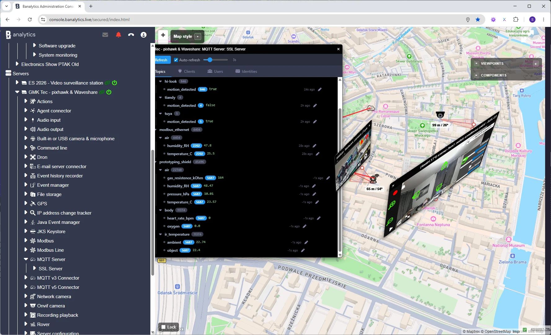 Banalytics Mapbox dashboard with a 3D city map, device locations, MQTT events, and analytical panels