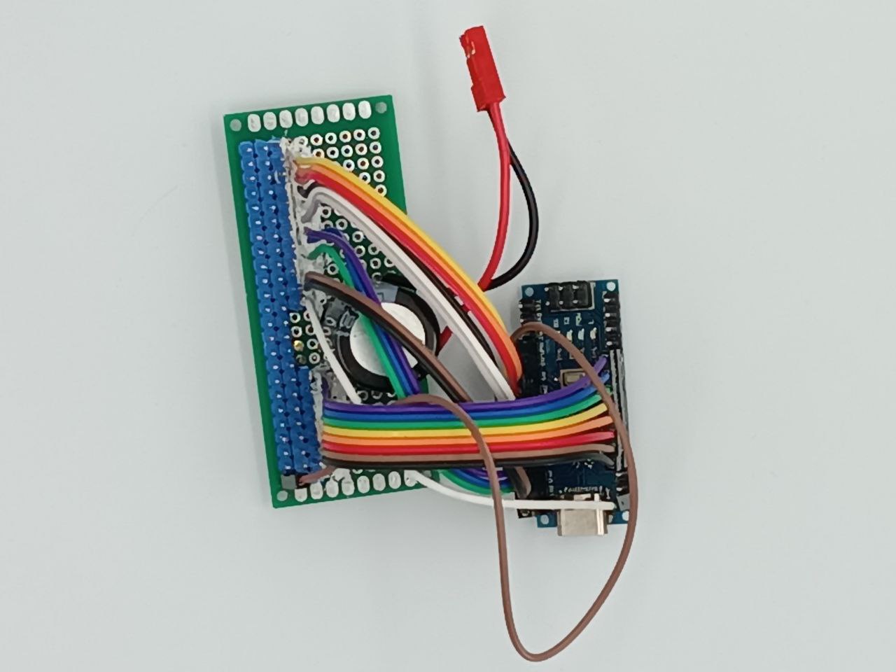 Arduino Nano mounted on a custom interface board for RC car motor, servo and lighting control